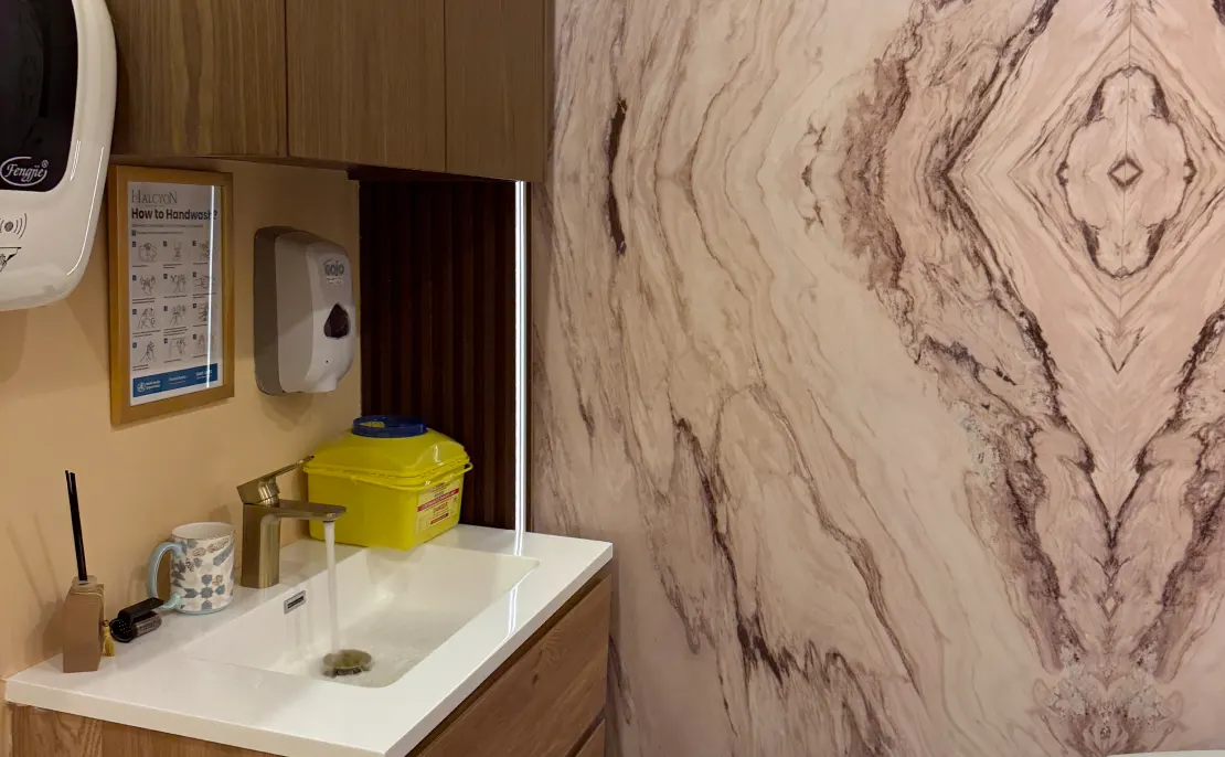 Clean and modern handwashing station inside Halcyon Aesthetics clinic, designed for hygiene, safety and patient care.